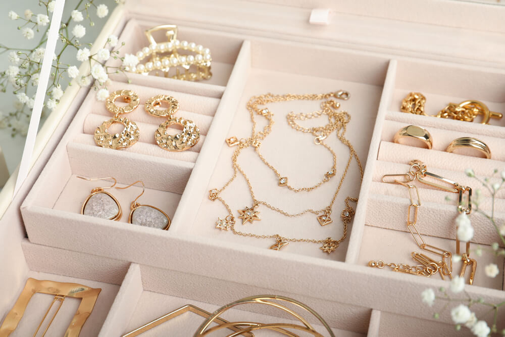 Jewelry box full of yellow gold fine jewelry pieces